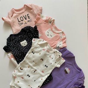 Set of 4 Never been used Onesies